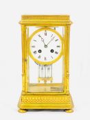 A gilt brass mantel clock