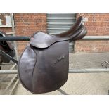 Brown leather Falcon saddle 18", wide fit, in excellent condition.