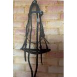 English leather black bridle. Stitched noseband, laced reins. Full size, new.
