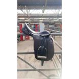 17" brown English West End dressage saddle, with irons and leathers. Wide fit.