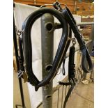 Set of PAIR harness, black and white metal with 23" collars. This lot carries VAT.
