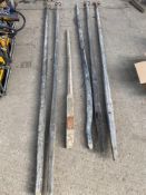 Five carriage poles and a pole for moving/propping vehicles