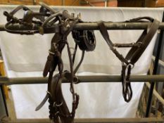 Set of brown harness with quick release tugs to fit a Shetland pony. This lot carries VAT.