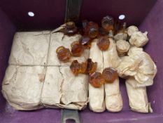 Approx 70 1" amber glass door/drawer knobs