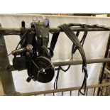 Set of black and white metal cob harness. This lot carries VAT.