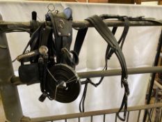 Set of black and white metal cob harness. This lot carries VAT.