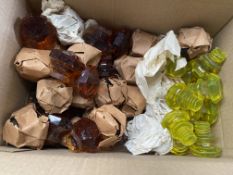 Amber glass door/drawer knobs together with lime green glass door/drawer knobs