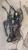 Quantity of harness; 2 black and brass carriage lamps; and a whip holder