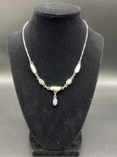 Silver necklace set with pearls