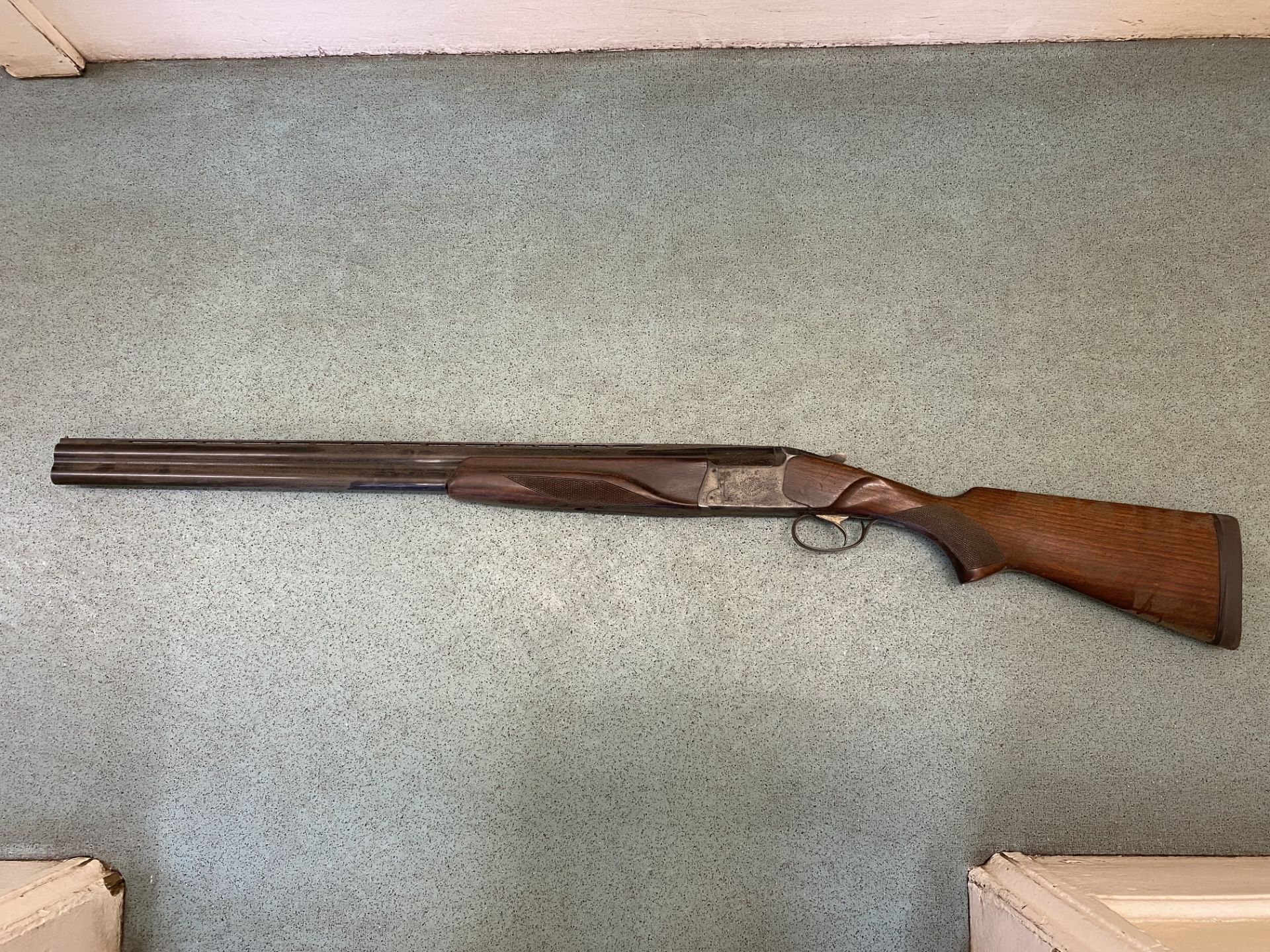 Baikal over/under 12 bore shotgun. Shotgun licence is required to possess this gun.