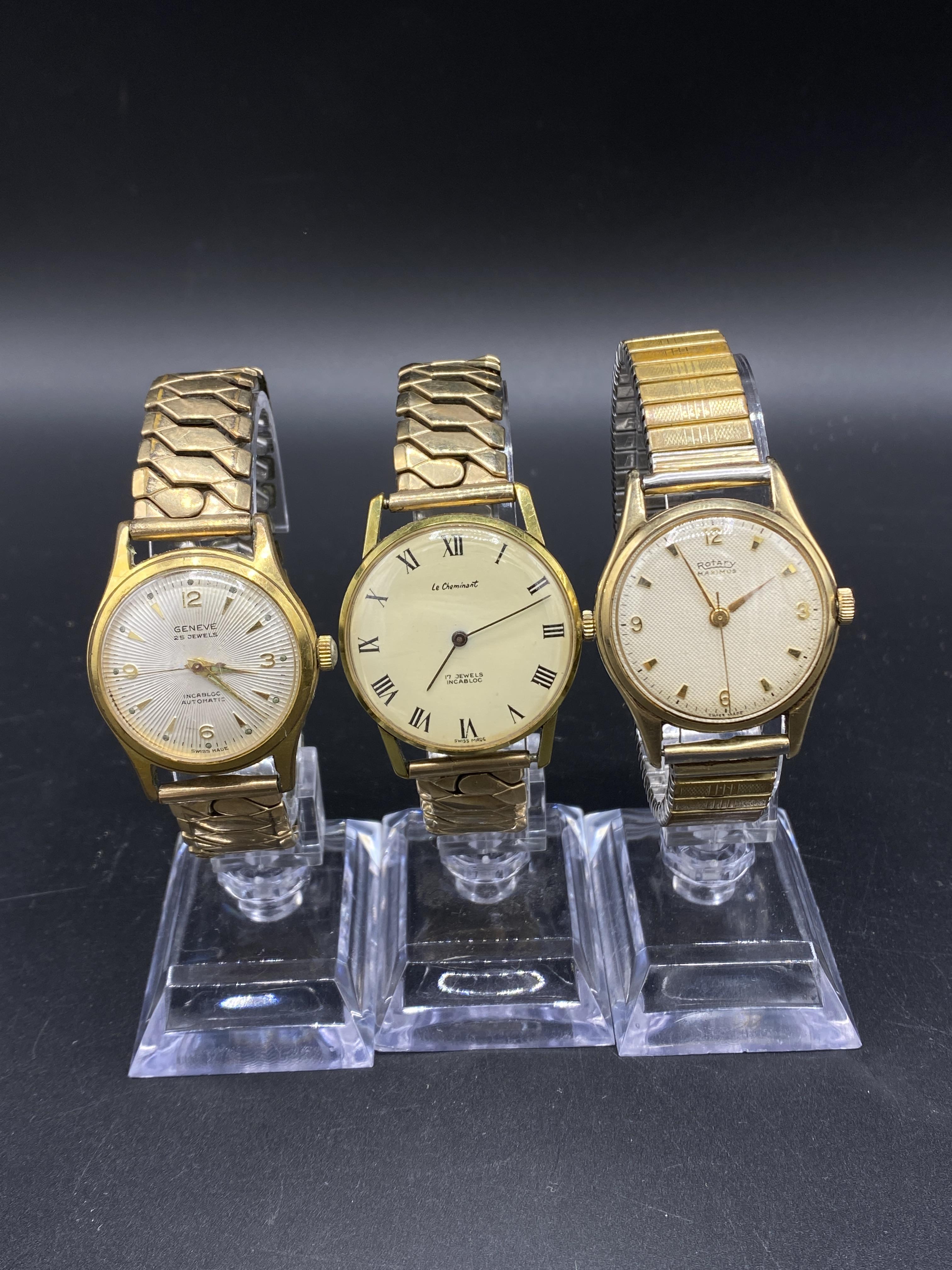 Three wristwatches