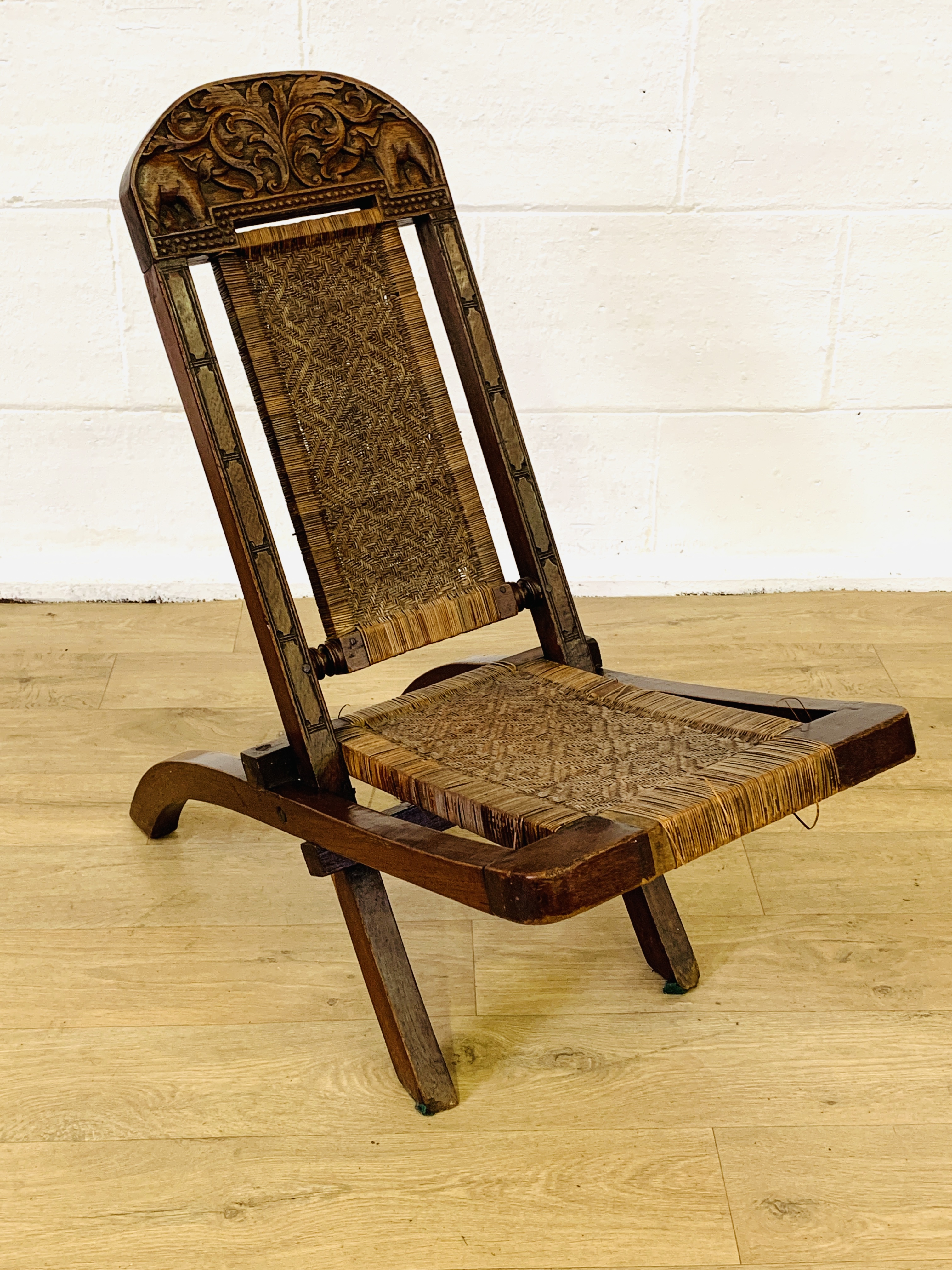 Carved wood folding chair