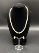 Pearl necklace with matching earrings