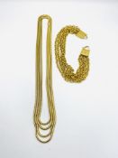 Christian Dior gold tone necklace together with another necklace