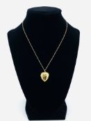 9ct gold heart shaped locket on a chain