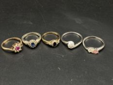 Five 9ct gold stone set rings