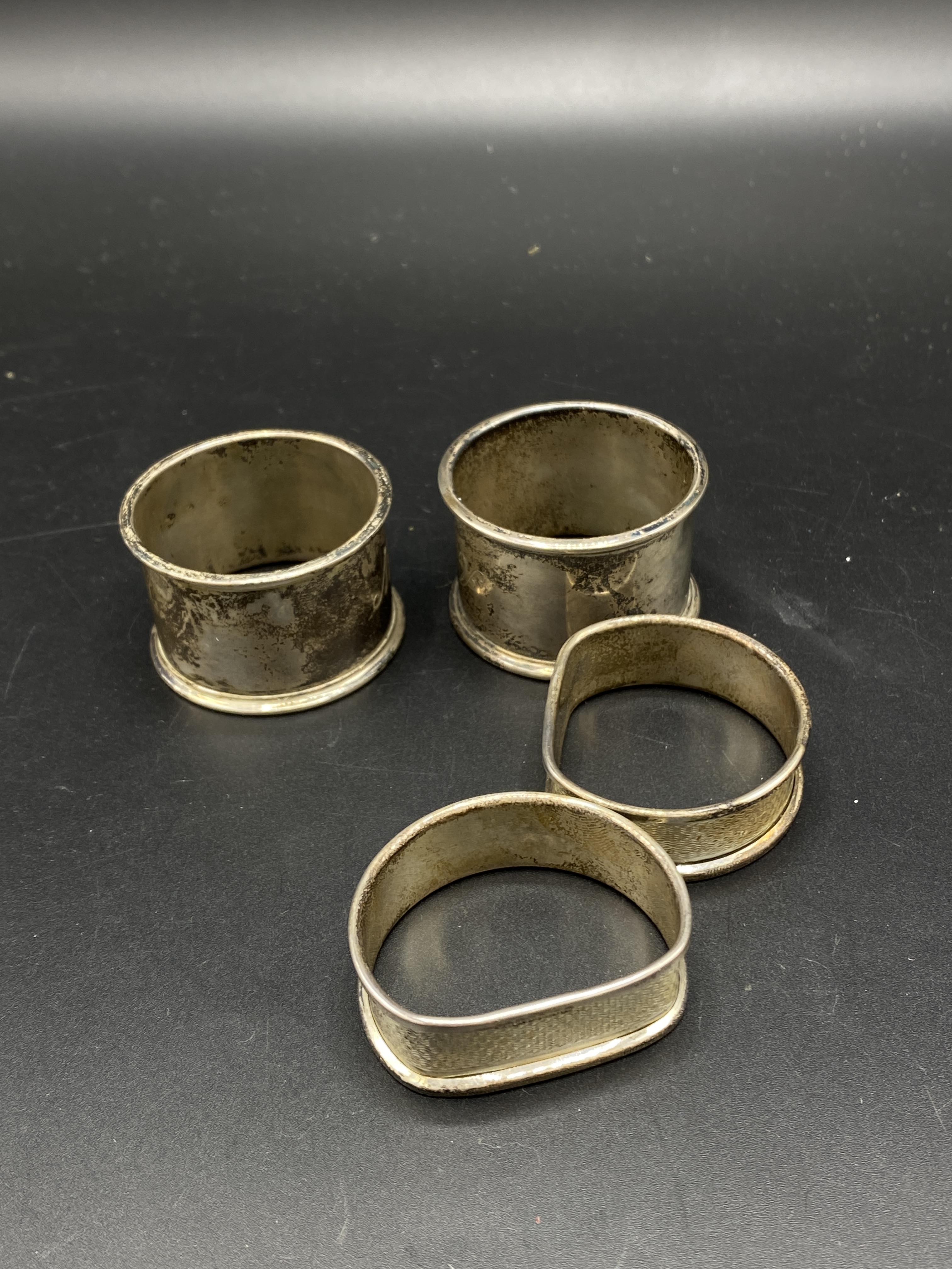 Four silver napkin rings