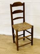 Child's mahogany chair with string seat