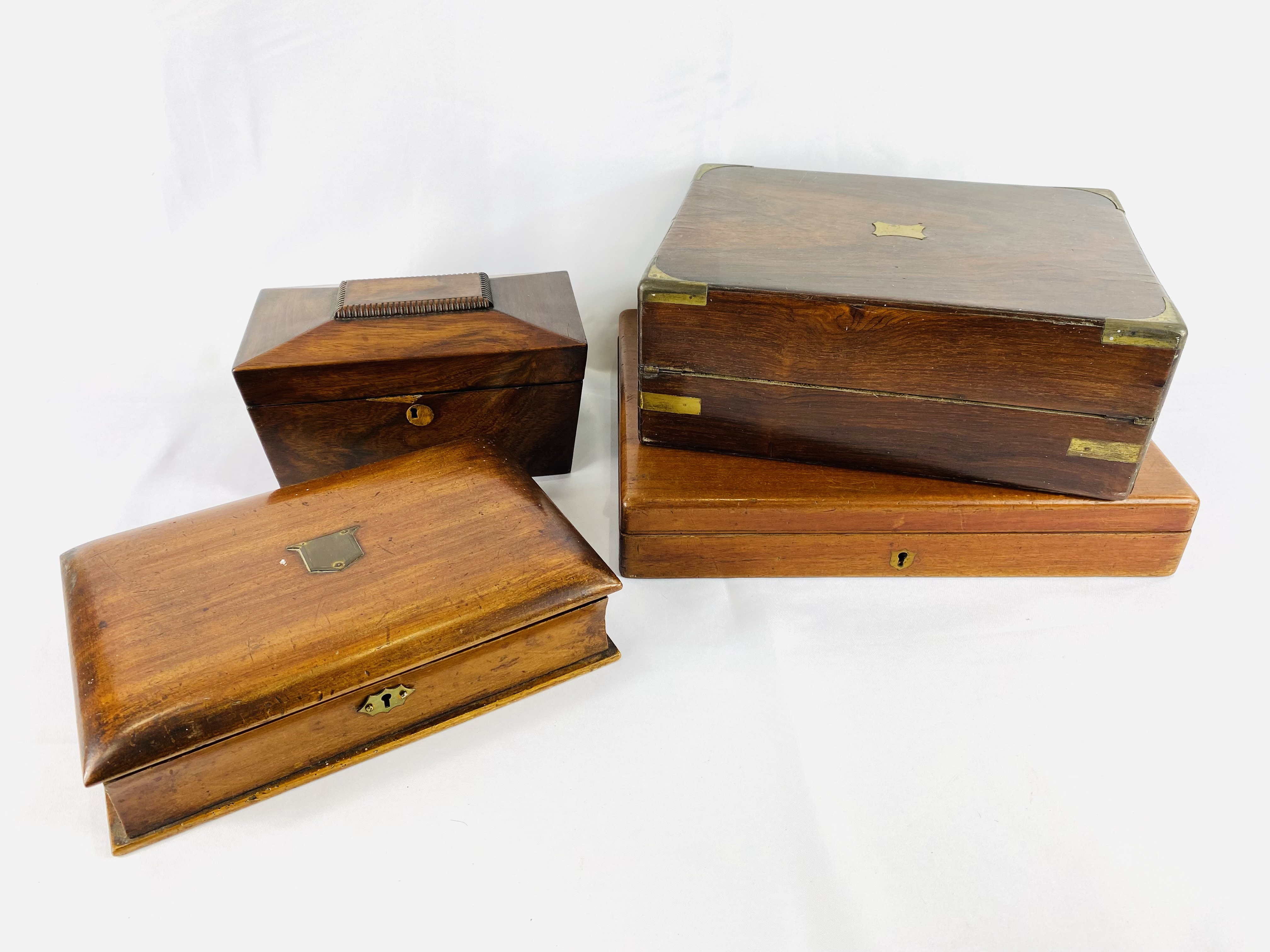 Rosewood writing box together with other boxes