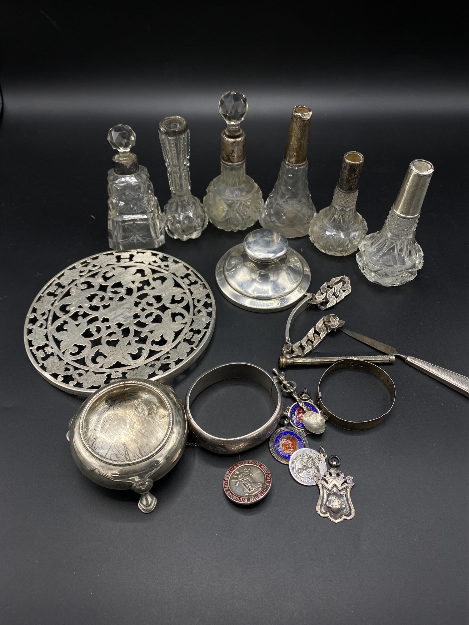 A quantity of silver for repair or restoration