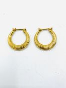 Pair of 18ct gold earrings