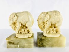 Two carved stone elephants