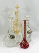 Two glass decanters, a glass ewer and glass vase