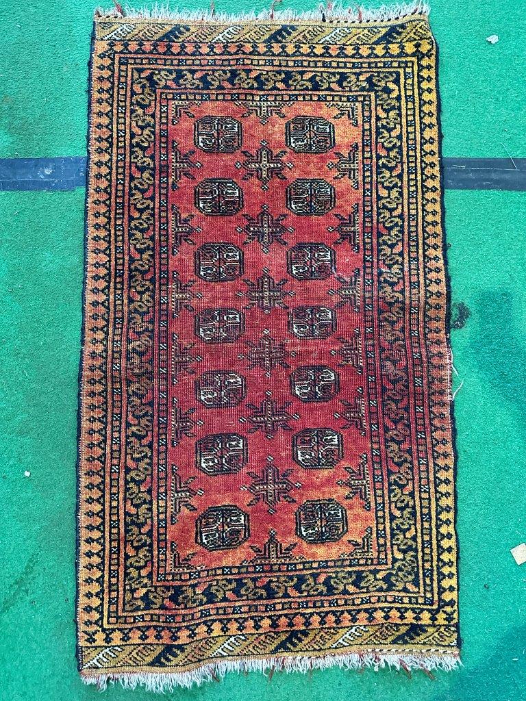 Wool red ground rug