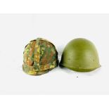 Two military helmets