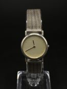 A ladies Thorup & Bonderup for Georg Jensen wrist watch with silver strap and case