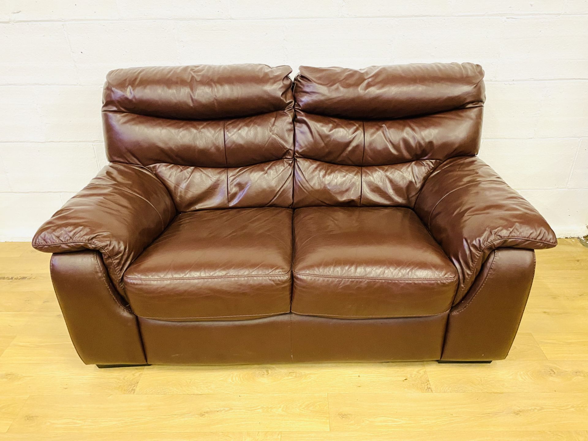 Leather style two seat sofa