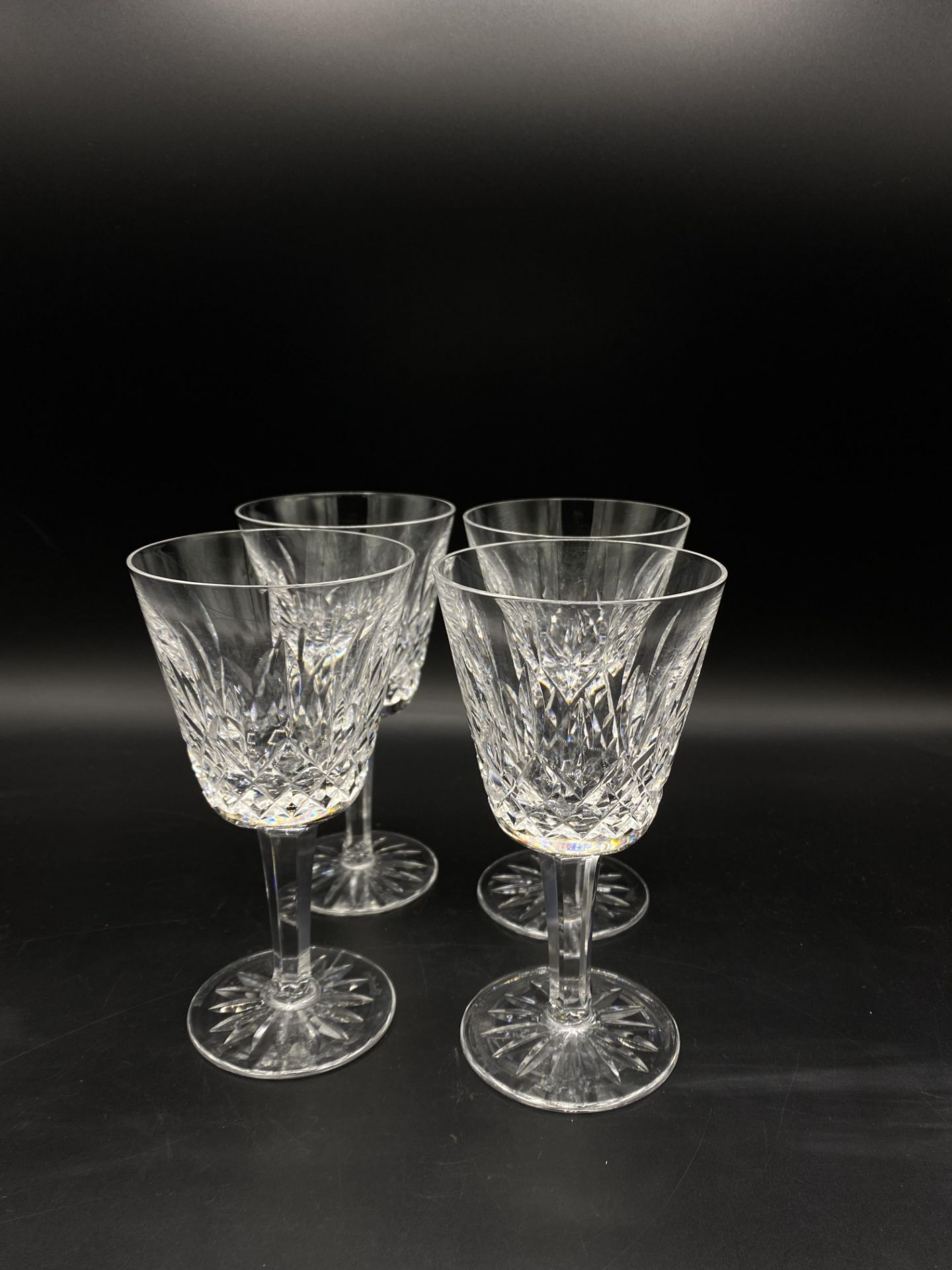 Four Waterford crystal wine glasses