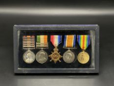 A medal presentation case containing five medals