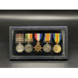 A medal presentation case containing five medals