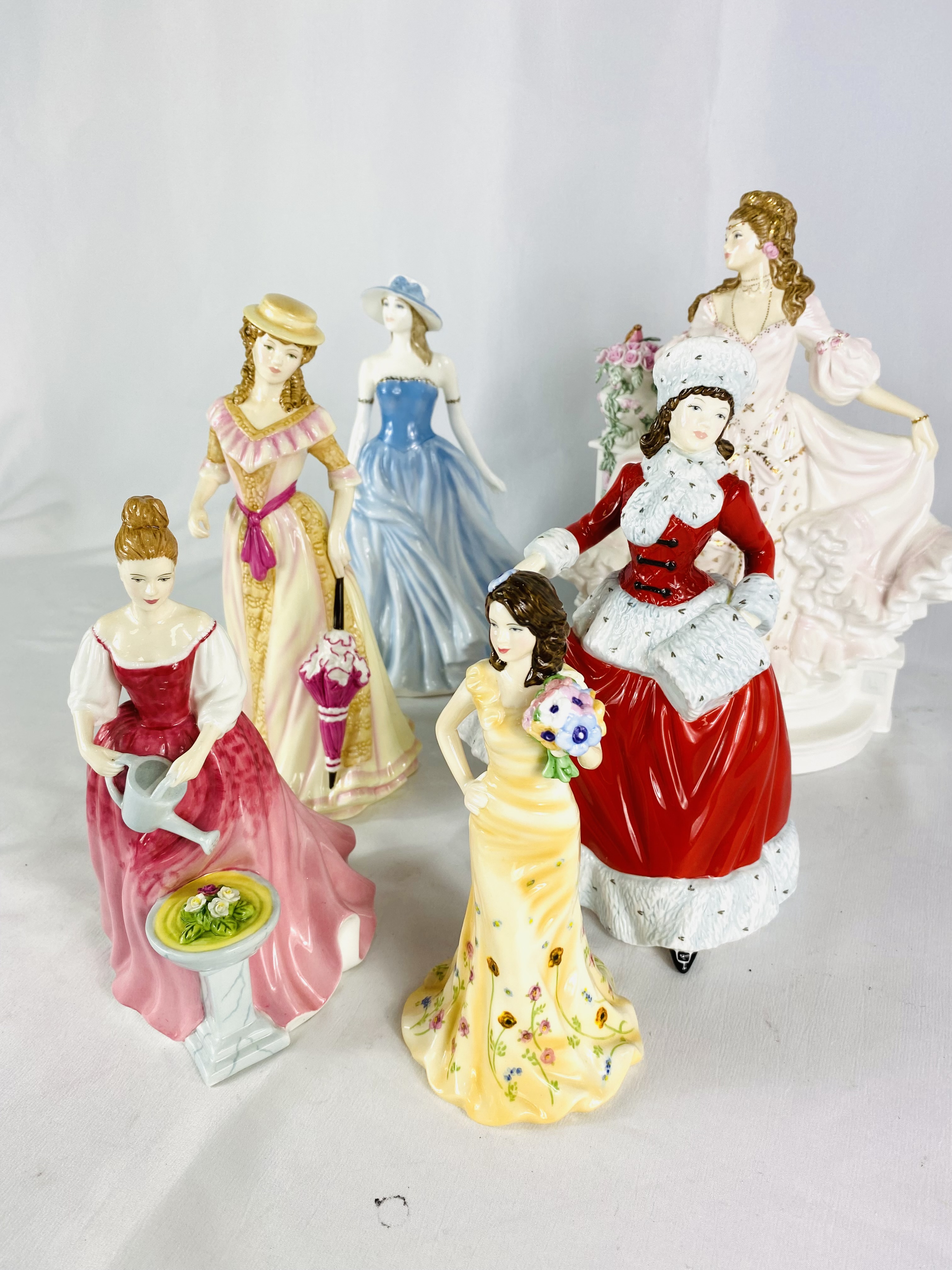 Six Royal Doulton figurines