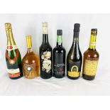 Five bottles of wine and port together with a bottle of Calvados