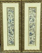 Two framed and glazed Oriental silk tapestries