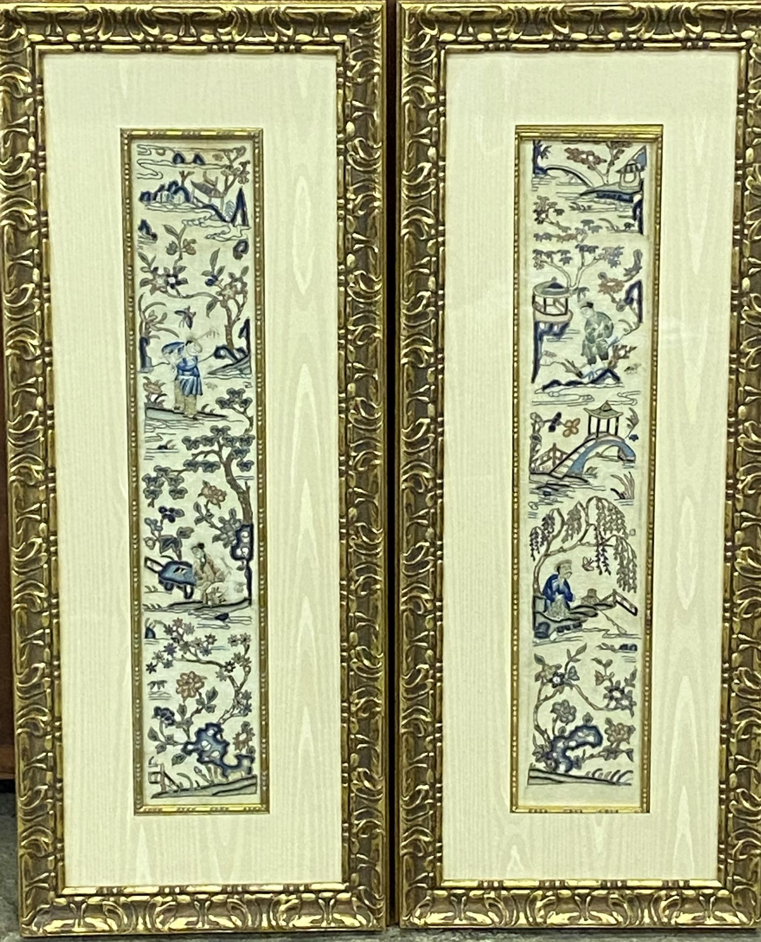 Two framed and glazed Oriental silk tapestries