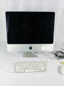 iMac computer with keyboard and mouse
