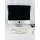 iMac computer with keyboard and mouse