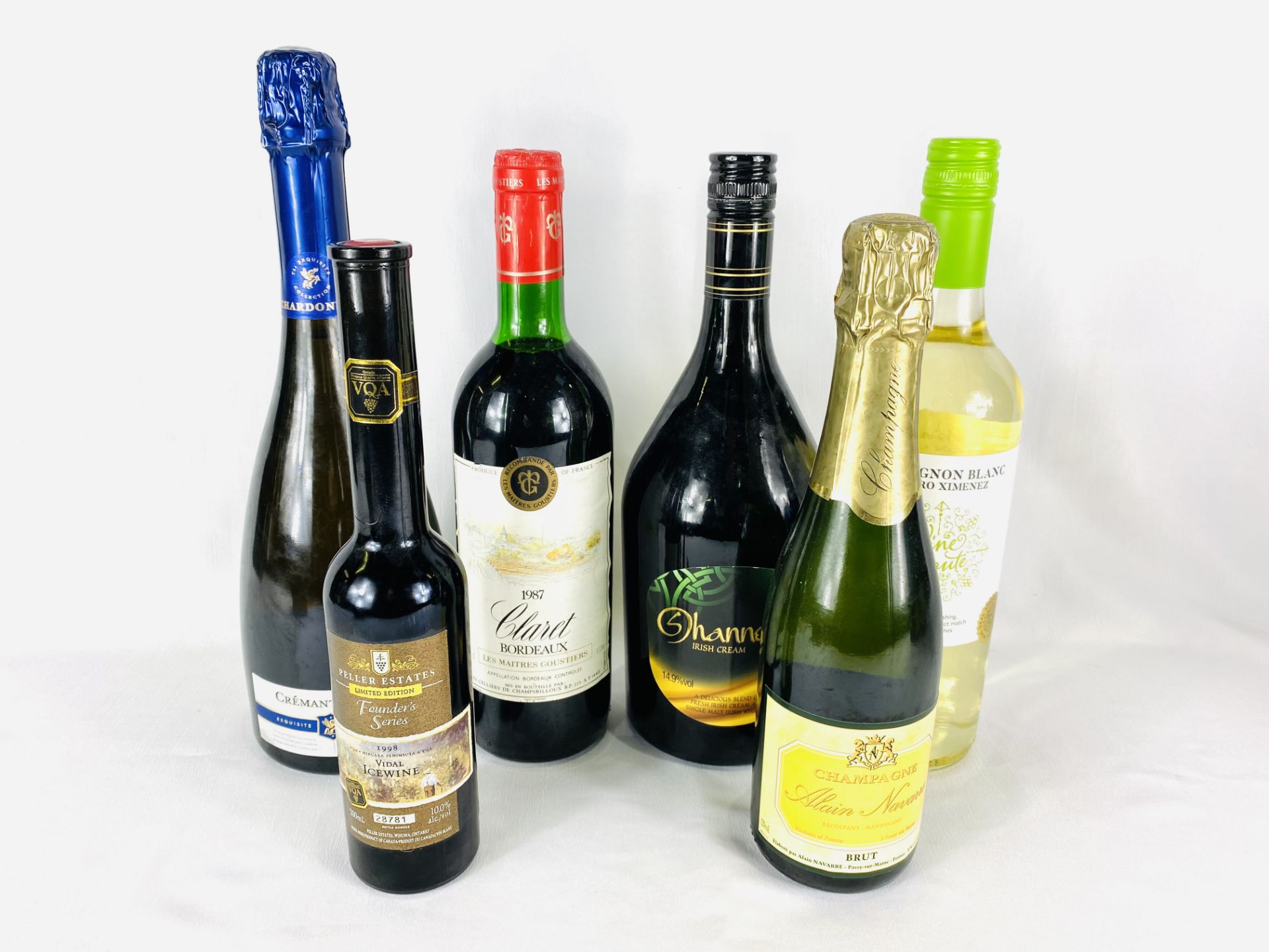 Quantity of wines, a bottle of champagne and a bottle of liqueur