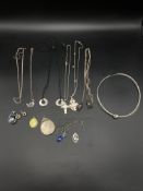 Quantity of silver necklaces and pendants