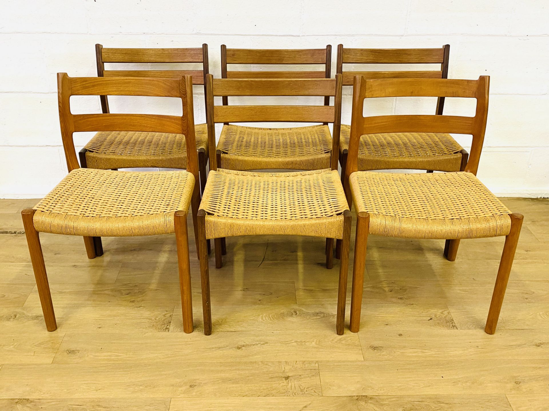 Set of four teak dining chairs together with two similar chairs