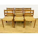 Set of four teak dining chairs together with two similar chairs