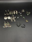 Quantity of silver earrings