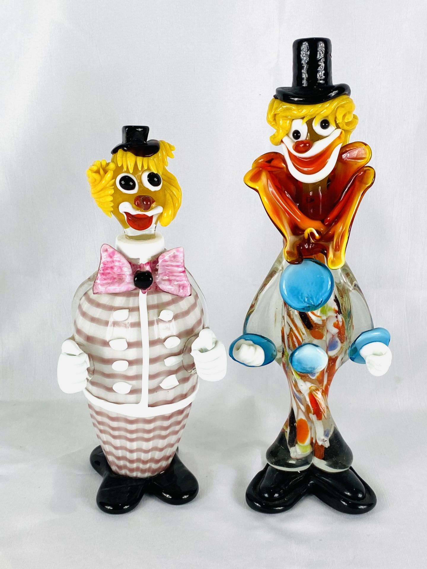 A Murano glass clown together with a Murano glass decanter
