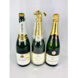 Three bottles of champagne