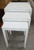 A Set Of 3 x Commercial Nesting Display Tables In White With Sturdy Metal Frames - Ex-Display