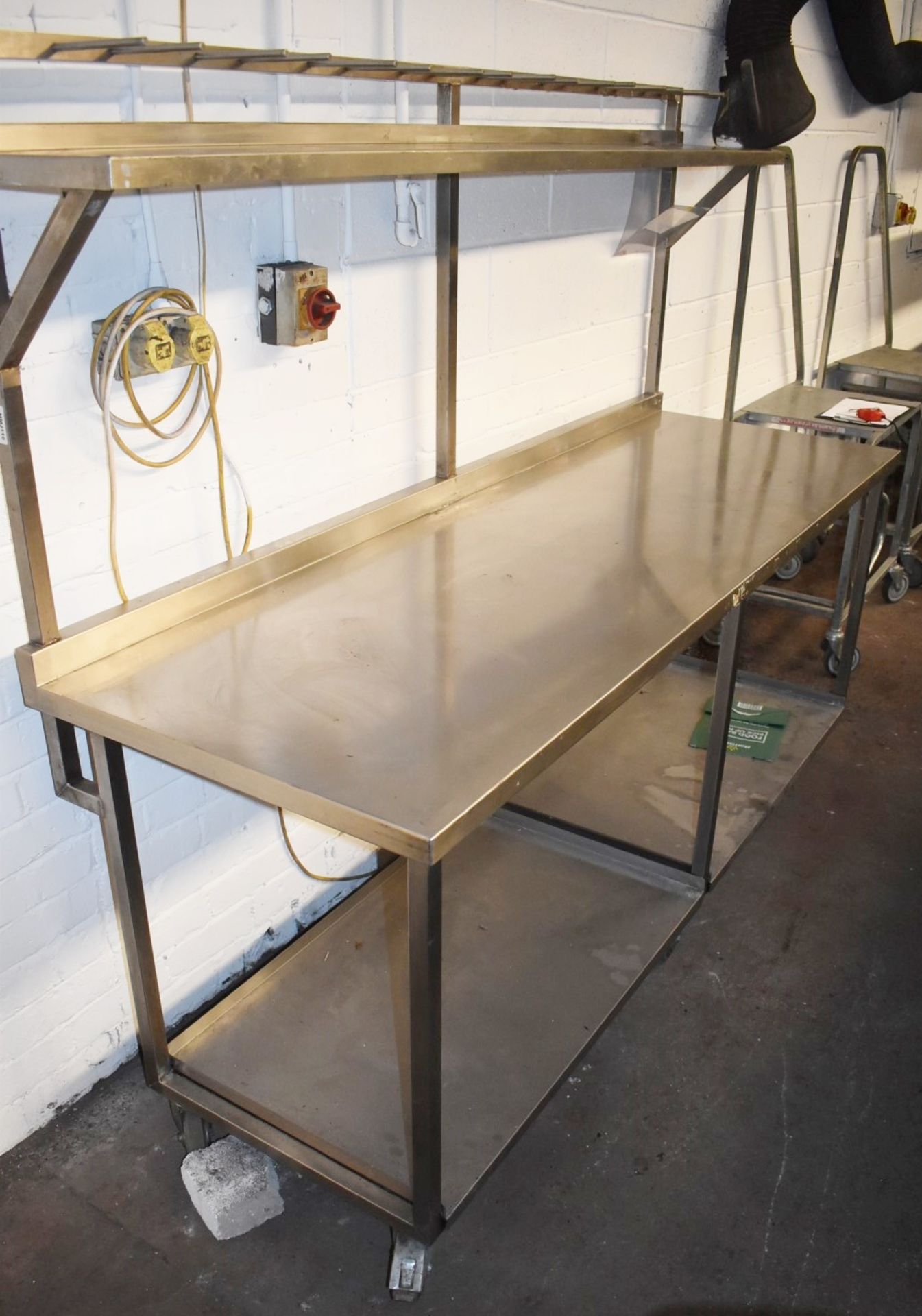 1 x Stainless Steel Donut Preperation Bench - Features Removable Undershelves, Castor Wheels and