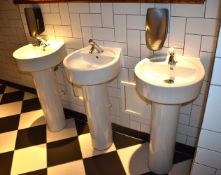 3 x Ideal Contemporary Wash Basins With Pedestals, Boss Chrome Mixer Taps and Chrome Soap Dispensers